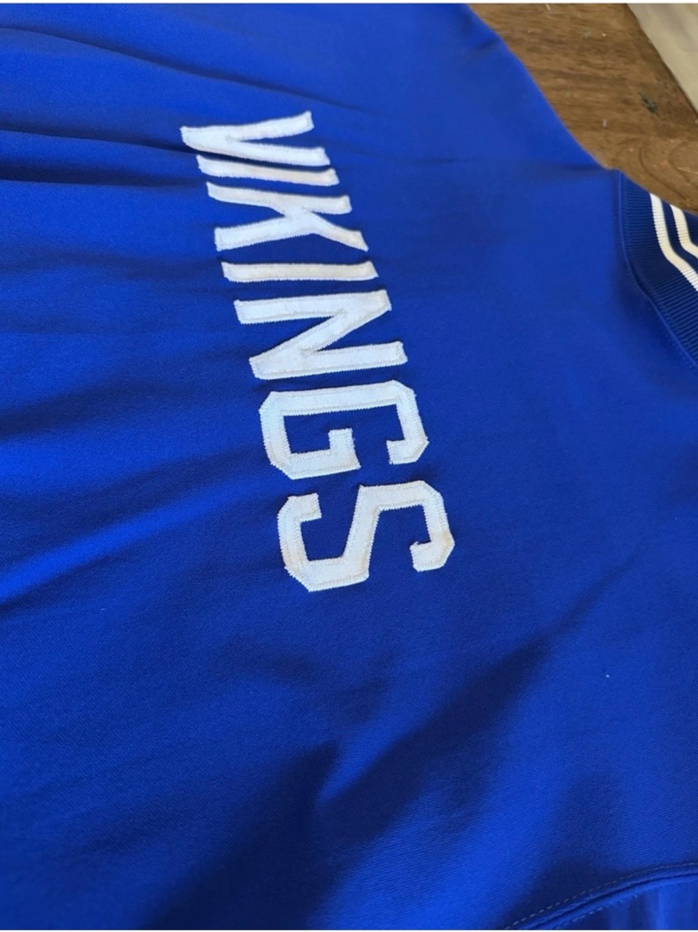 Russell Athletic Blue Vikings Crewneck Jacket with White Lettering and Snaps